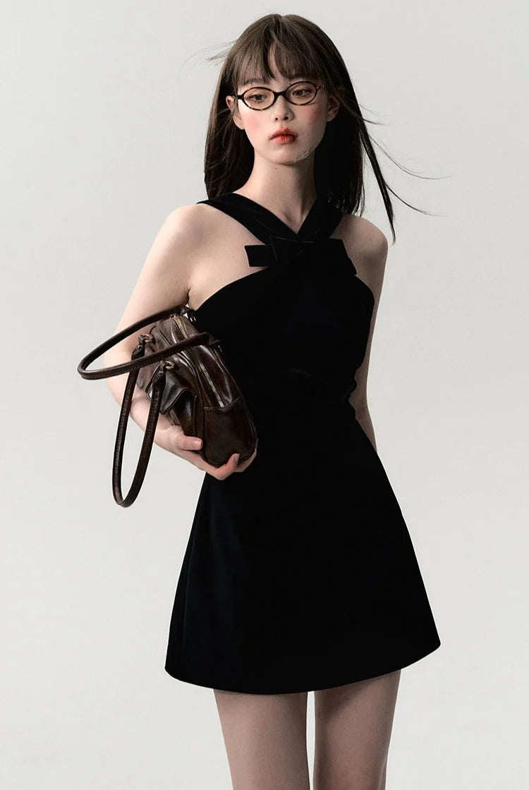 Sleeveless Mini Dress with Velvet Crisscross Neckline and Bow Detail