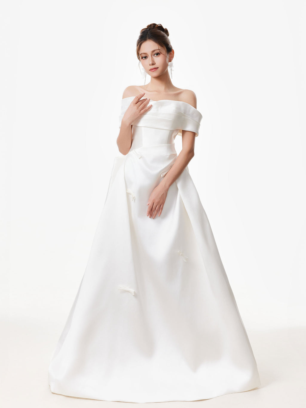 Off Shoulder Satin Gown with Draped Bodice and Bow Accents