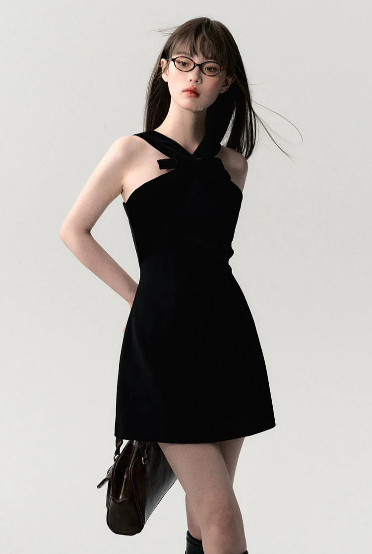 Sleeveless Mini Dress with Velvet Crisscross Neckline and Bow Detail